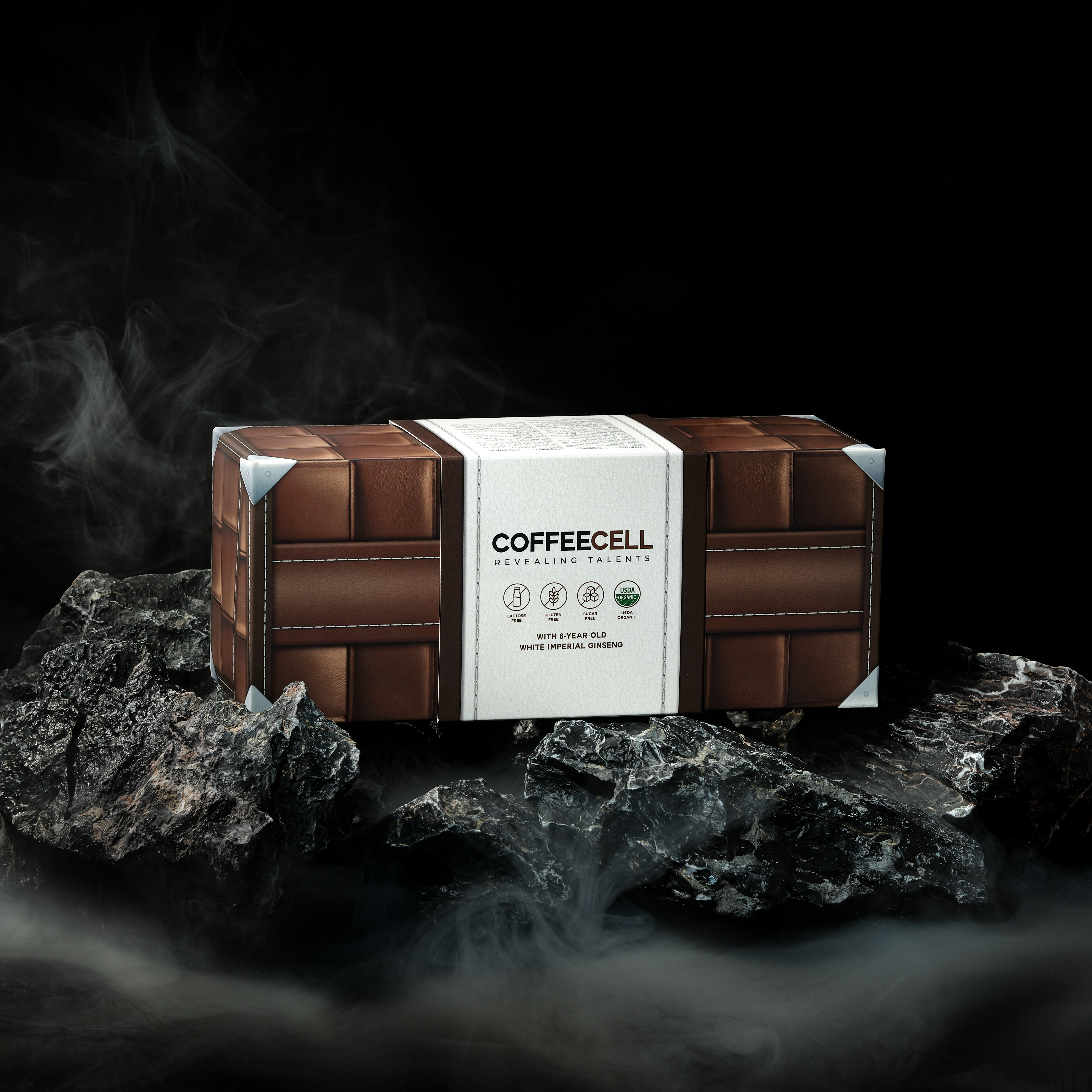 A brown box of COFFEECELL hot chocolate box on rocks