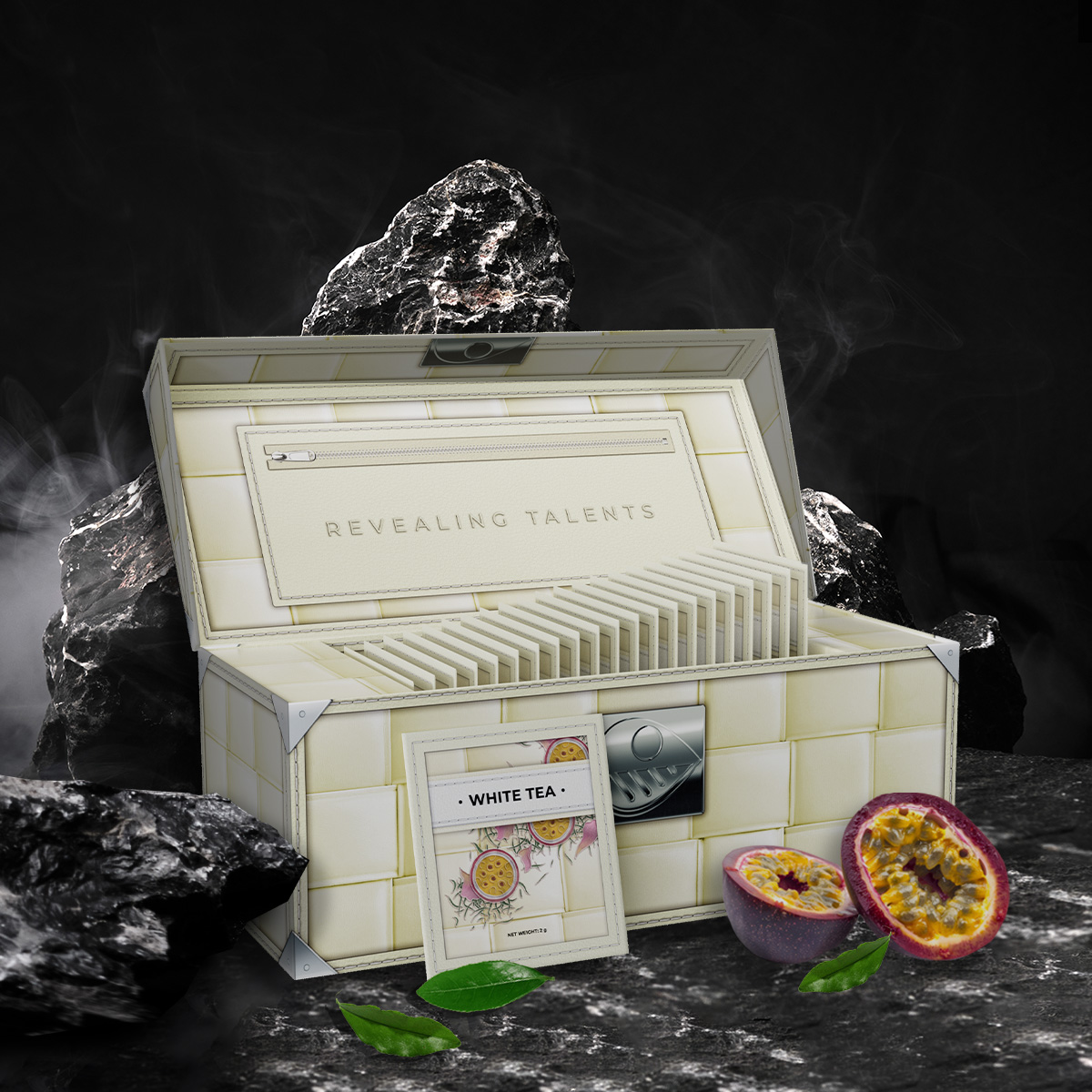 An opened beige box of COFFEECELL white tea on rocks